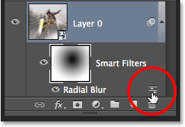 The Smart Filter Blending Options icon in the Layers panel. Image © 2013 Photoshop Essentials.com