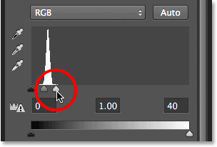 PS快速制作繁星 优图宝网 PS入门实例教程Dragging the white point slider towards the left. Image ? 2013 Photoshop Essentials.com