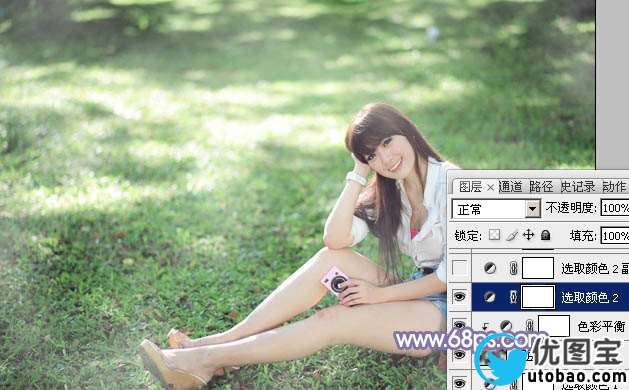 Photoshop给绿草中的美女加上梦幻的青色调