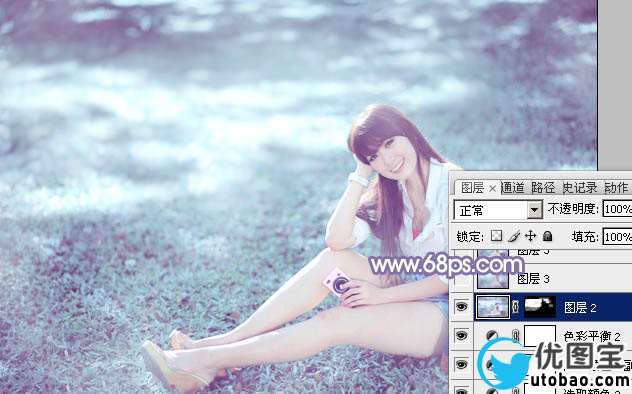 Photoshop给绿草中的美女加上梦幻的青色调