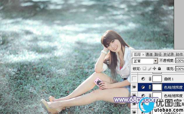 Photoshop给绿草中的美女加上梦幻的青色调