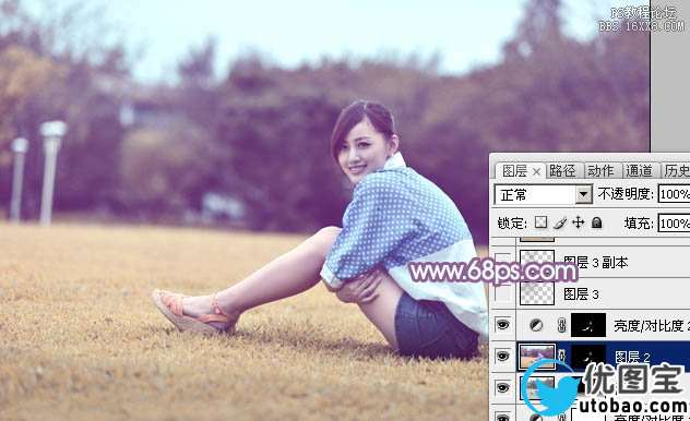 Photoshop给草地上的美女加上甜美的淡调蓝黄色
